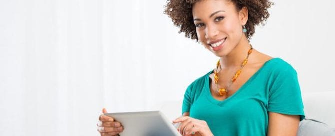 girl holding ipad