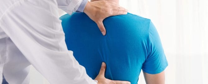 Doctor physiotherapist doing healing treatment