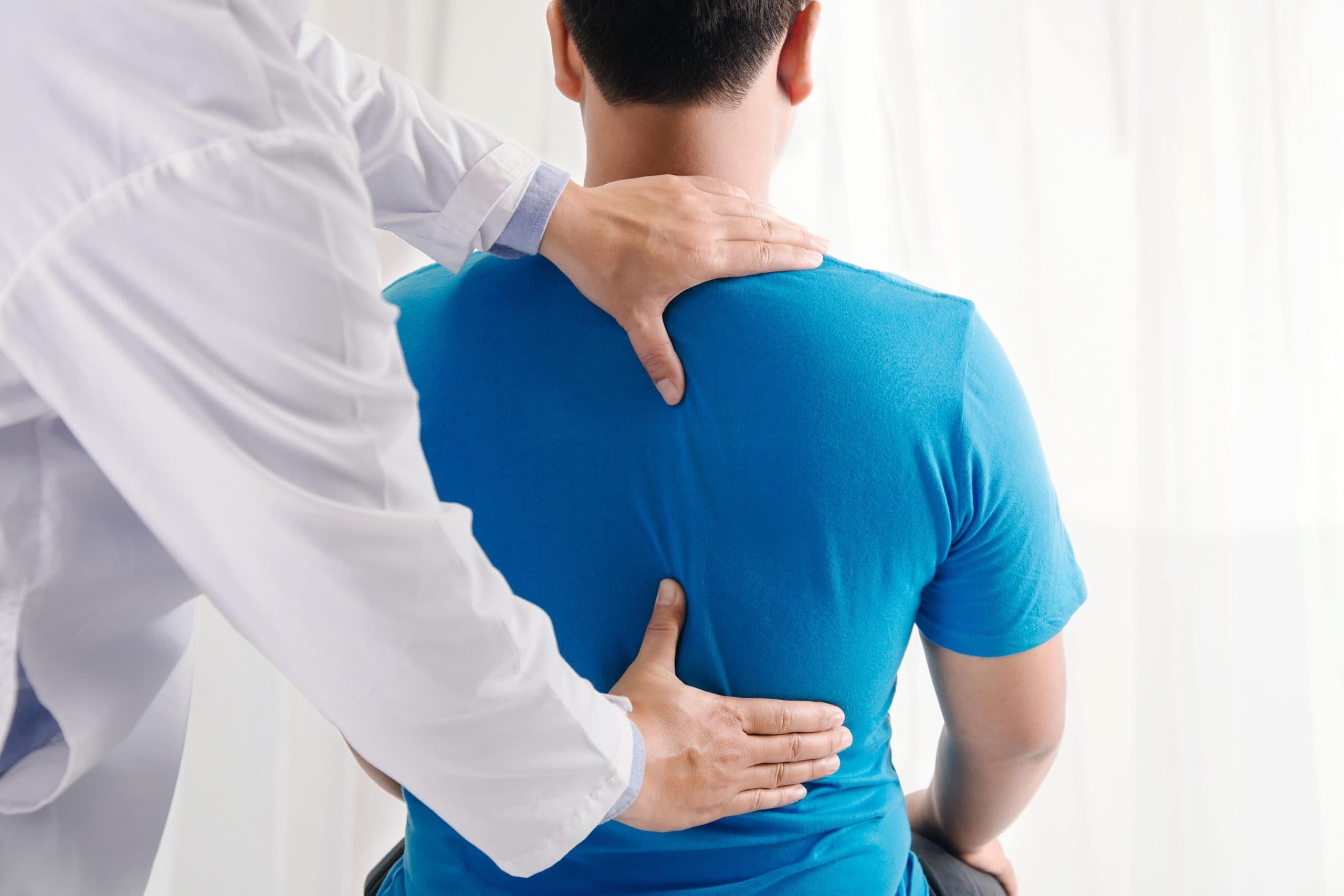 front-view-doctor-explaining-anatomy